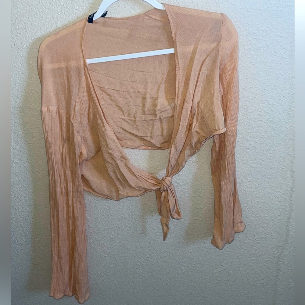 Worn once. Size XS Boohoo beach tie top and wide leg beach pants.